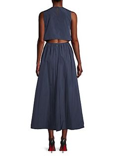 Emporio Armani's sleeveless midi-dress is made from taffeta, featuring a round neck, cut-out back, and an A-line skirt..Round neck.Sleeveless.Zip and button back.100% polyester.Dry clean.Imported..SIZE & FIT..About 54" from shoulder to hem.Model measurements: 6'1" tall.Model is wearing a US size Small. Midi Dress Sleeveless, Tall Model, A Line Skirt, Model Measurements, A Line Skirts, Saks Fifth, Saks Fifth Avenue, New Arrivals