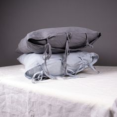 three pillows stacked on top of each other