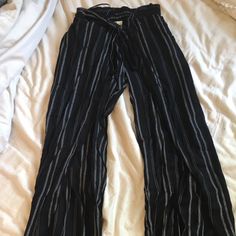 Great Quality- Never Worn Open Side Flowy Pants Size Xs Trendy Black Beach Pants, Black High-waisted Pants For Vacation, Trendy Black Wide Leg Pants For Vacation, Black Long Pants For Vacation, Black Straight Pants For Vacation, Black Trousers For Vacation, Black Ankle-length Vacation Bottoms, Black Wide Leg Beach Pants For Spring, Black High-waisted Beach Pants