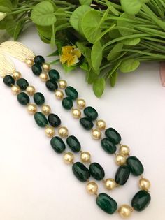 Exclusive quality green emerald facitate beads necklace. AAA super fine quality of emerald green faceted beads necklace. Most eligible gift for someone you love and someone very special for you. Best gift for your anniversary. Best gift for her birthday. Necklace : 1  Earrings : 1 pair Green Round Kundan Necklace In Temple Jewelry Style, Green Round Kundan Necklace With Cutdana, Green Emerald Jewelry For Festivals, Green Emerald Necklace For Celebrations, Temple Style, Green Necklace For Diwali, Green Emerald Temple Jewelry Necklace For Celebration, Green Gemstone Beads Necklace For Wedding, Green Emerald Kundan Necklace As A Gift, Green Emerald Kundan Necklace For Gift