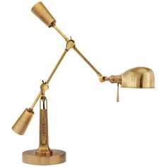 a gold desk lamp with two lamps on it