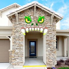 a house with two green eyes on the front