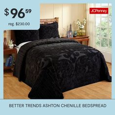 a bed with black bedspread and pillows on it for $ 69 99 reg $ 350 00