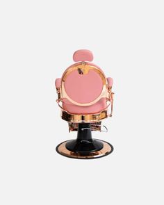 a pink chair with gold trimmings and the words john barberson's