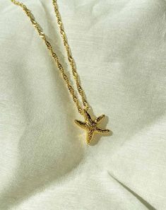 A perfect summer necklace for beach wear or resort wear with handmade metal starfish on 1 micron gold plated (18k) stainless steel (which is allergic free and nickel free) Layer it with our other neckpieces or just wear it as a single statement piece. Starfish Necklace, Semi Precious Jewelry, Summer Necklace, Silver Moon, Bangle Set, Silver Cuff, Bracelets And Charms, Resort Wear, Starfish