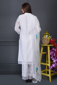 White straight long kurta with all-over floral motif applique-thread work, scallop neckline and lace trim hem. Comes with pants and embroidered dupatta.
Component: 3
Embroidered
Neckine: V Neck
Sleeve Length: Three Quarter
Fabric: Kurta and Pant: Silk Chanderi; Dupatta: Chiffon
Color: White
Cutwork border dupatta
Lace trims
Scallop neckline - Aza Fashions Dupatta Lace, Scallop Neckline, Chanderi Dupatta, White Kurta, Fashion App, Kurta Set, Designer Gowns, White Silk, Cut Work