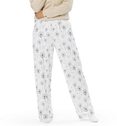 Get the comfort of pajamas in this stylish pair of wide-leg pants. With the adjustable waist and stretchy fabric, it's like your favorite sweatpants but better. * Relaxed unisex fit * Practical side pockets * Elastic waistband with a white drawstring * Can be worn on the waist or on the hips * Premium knit mid-weight jersey fabric * 95% polyester, 5% elastane (fabric composition may vary by 1%) * Fabric weight: 6.19 oz/yd2 (210 g/m2) (weight may vary by 5%) Comfortable Pants For Spring Pajama Party, Comfortable Pants For Pajama Party In Spring, Wide Leg Pants With Elastic Waistband For Bedtime, Floral Print Relaxed Fit Bottoms For Pajama Party, Comfortable Relaxed Fit Pants For Bedtime, Comfortable Relaxed Fit Bedtime Pants, Floral Print Relaxed Fit Pajamas, Relaxed Fit Pants With Elastic Waistband For Bedtime, Floral Print Relaxed Fit Long Sleepwear Pants