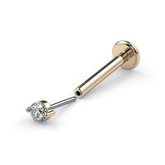 Our latest diamond flat back is quite unique with its two-prong setting. This 1.7mm genuine diamond labret is a wonderful choice for anyone with a lip, nose or cartilage piercing. The tiny 1.7mm diamond has a brilliant sparkle and the flat disc backing ensures all-day comfort in your body piercing. Crafted with the highest attention to detail, this genuine diamond flat back earring provides a sophisticated, timeless look that comes with a hint of luxury. Diamond Carat: .02ct. (1.7mm), conflict-f Yellow Gold Diamond Piercings Internally Threaded, Yellow Gold Piercings With Prong Setting Round Cut, Diamond Nose Ring, Vs1 Diamond, Flat Back Earrings, Lip Ring, Jewelry Words, Cartilage Piercing, Body Piercing Jewelry