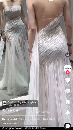 the back of a woman's dress in front of a mirror with her reflection