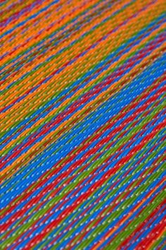 close up view of multicolored woven material