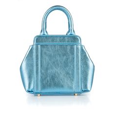 More to love in a mini. As the newest version of the iconic Nott handbag, this crowd favorite packs a punch. The Mini Nott can always be carried with its top handles or chain strap, and it always rises to the occasion – no matter the occasion. Dimensions: Height: 12.5 cm / 5 in Length: 18 cm / 7 in Depth: 4.5 cm / 1.75 in Removable, Gold Chain Strap: 125 cm Composition: Gold hardware accents Italian leather Interior: Custom artwork by: Artemis Antippas of New Orleans Snap closure Pocket Dust bag Rainbow Chicken, Modern Handbag, Interior Artwork, Glitter Rainbow, Chicken Bones, Bone Color, Metallic Pink, Belt Accessories, Business Meeting