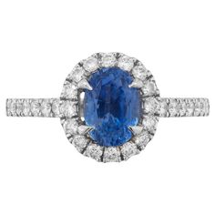 an oval blue sapphire and diamond ring