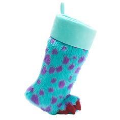 a blue and purple stocking with polka dot pattern on it's bottom, sitting against a white background