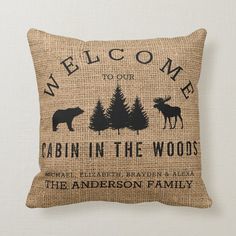 a burlock pillow with the words welcome to our cabin in the woods on it