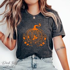 Halloween Unisex Tee Shirt | Orange Pumpkin Tshirt | Trick or Treat Tshirt | Halloween Gifts ✔️ Soft, light and comfortable unisex short sleeve tee ✔️ 100% Airlume combed and ringspun cotton (fiber content may vary for different colours*) ✔️ Light fabric (4.2 oz/yd² (142 g/m ✔️ Retail fit 📏 Runs true to size ✔️ Dual side seams for structural support of the garment help hold its shape longer ✔️ Ribbed knit elastic collars to bolster shaping, twill taped shoulders to prevent stretching and for be Spooky Orange T-shirt For Fall, Spooky Fall T-shirt Pre-shrunk, Orange Spooky T-shirt For Fall, Spooky Orange Fall T-shirt, Halloween Clothing, Halloween Tshirt, Orange Pumpkin, Halloween Tees, Limassol