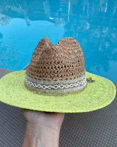 These are one of a kind Panama Hats! Featuring a hand painted brim, a unique and delicate hat ribbon, finished with cute little charms to brighten your day! The hat is constructed from 100% paper styled in a patterned weave accent. So super cute for the pool, the beach, bbq's, wine tasting, happy hour and more!! Makes a very special gift as well.Approx Measurements:Circumference: 22"Crown Height: 5.25"Brim: 3"100% Recycled Paper Green Fedora With Curved Brim For Spring, Adjustable Brimmed Green Mini Hats, Adjustable Green Fedora For Spring, Adjustable Green Brimmed Mini Hats, Adjustable Green Fedora Hat Band, Green Adjustable Hat Bands For Kentucky Derby, Adjustable Green Hat Bands For Kentucky Derby, Adjustable Green Hat Band For Kentucky Derby, Handmade Cute Summer Hat