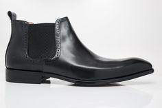 Style: 478-11-Black Stunning Burnished Calfskin slip-on Boot from the Carrucci collection features a Double Gore for a perfect fit and a clean welt! Classic Black Chelsea Boots With Brogue Detailing, Classic Black Chelsea Boots For Business, Formal Black Chelsea Boots With Leather Lining, Classic Slip-on Boots With Rubber Sole, Classic Black Goodyear Welted Chelsea Boots, Classic Slip-on Boots With Brogue Detailing, Formal Chelsea Boots With Textured Sole And Round Toe, Elegant Chelsea Boots With Rubber Sole And Round Toe, Classic Chelsea Boots With Round Toe