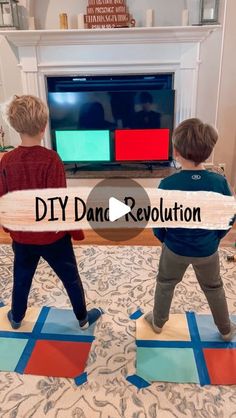 two young boys standing in front of a tv with the words diy dance revolution on it