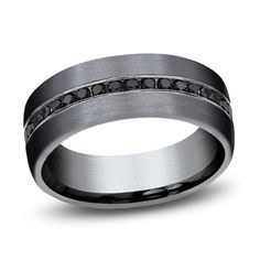 men's wedding band with black diamonds inlayed into the center and channel