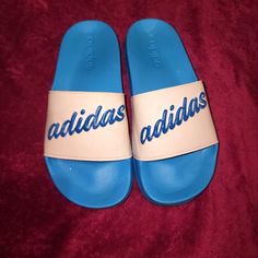 Nwot Blue And White Adidas Size 6 Slides Adidas Blue Sandals For Spring, Spring Blue Adidas Sandals, Blue Sporty Flat Sneakers, Trendy Blue Non-slip Sandals, Sporty Blue Flat Sneakers, Adidas Blue Slip-on Sandals, Blue Adidas Slip-on Sneakers, Spring Blue Adidas Sneakers, Blue Flat Sneakers For Sports