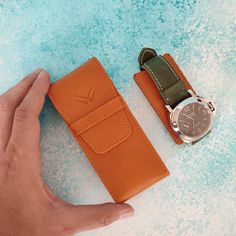 "This beautiful handmade leather watch case is made from veg-tanned calfskin leather. It fully protects your watches from scratches and impacts due to the resilience of this particular leather and its solid structure. The leather piece inside the watch pouch keeps your watch from moving. Keeping your watches in your luggage without protection might lead to disaster! This small and compact watch pouch would be perfect for your travels.  It is such a small and compact watch case that you can even Rectangular Leather Watch Accessories For Everyday Use, Leather Watch Accessories For Everyday Use, Timeless Leather Case With Included Case, Everyday Round Case Watch With Leather Strap, Rectangular Leather Watch For Gift, Rectangular Leather Watch As A Gift, Leather Watch Accessories With Case, Rectangular, Rectangular Leather Watches As Gifts, Rectangular Leather Watch Bands As Gift