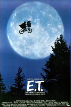 a movie poster for the film e t with a person on a bicycle in front of a full moon