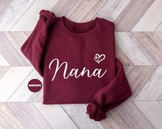 Cute Nana Sweatshirt, Grandma Hoodie, Gigi Mimi Sweatshirt, Mom Life Hoodie, Grammy Birthday Gift, Grandmother To Be Clothing, Granny Outfit HOW TO ORDER: - Please, check and review all the photos. - Select your Sweatshirt size from the selection box. - Select your Sweatshirt color from the selection box. - Personalization box is only for design color information, enter your design or text color in the personalization box (see images for options) UNLESS otherwise indicated. - Select the quantity Personalized Long Sleeve Sweatshirt As Gift, Long Sleeve Sweatshirt With Name Print As Gift, Personalized Name Print Sweatshirt As Gift, Long Sleeve Winter Birthday Sweatshirt, Long Sleeve Sweatshirt For Mother's Day Gift, Granny Outfit, Sweatshirts For Grandma, Personalized Name Print Long Sleeve Sweatshirt, Mimi Sweatshirt Ideas