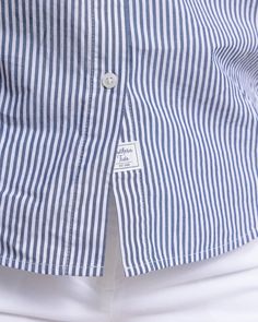 Polished and professional, this long-sleeve button-down gives you timeless style from the boardroom to the boardwalk. Our soft cotton top features a shirt tail hem and button cuffs for a custom fit that's both sophisticated and casual. Style: 10871 Classic Navy Cotton Dress Shirt, Timeless Cotton Tops With Button Cuffs, Classic Blue Shirt With Roll-up Sleeves, Casual Navy Button-up Dress Shirt, Navy Cotton Shirt With Button Cuffs, Classic Shirt With Roll-up Sleeves For Daywear, Classic Navy Shirt With Button Closure, Classic Shirt With Cuffed Sleeves For Business Casual, Classic Navy Top For Everyday