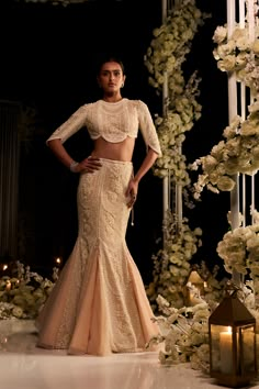 This fish cut lehenga set features intricate pearl, sequin and crystal embroidery on a powder peach net base. The ensemble is paired with a delicately scalloped blouse and an embroidered net dupatta.From Seema Gujral's Tuscan Summer collection. DELIVERY TIMEPlease allow 8-12 weeks for your outfit to arrive. FABRIC DETAILSNet Professional cleaning only. Fish Cut Lehenga, Fish Cut Gown, Tuscan Summer, Diwali Outfit, Engagement Dress For Bride, Fish Cut, Seema Gujral, Scalloped Blouse, Sangeet Outfit