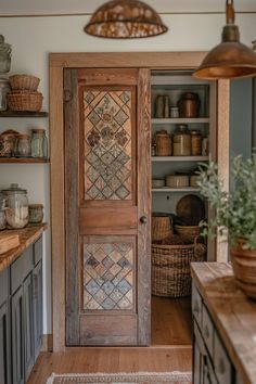 a wooden door sitting inside of a kitchen