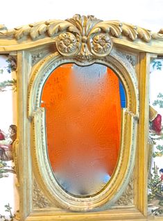 Antique French carved and upholstered wall mirror. Top bonnet is carved with acanthus foliage and rosette medallions with a floral centerpiece. The base is carved with a foliate frieze and rose centerpiece. The oval mirror is flanked with turned spindles and toile upholstered panels. No maker's mark. Rose Centerpiece, Rose Centerpieces, Floral Centerpiece, Upholstered Panels, Oval Mirror, Maker's Mark, Floral Centerpieces, One Kings Lane, Wall Mirror