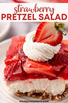 strawberry pretzel salad on a white plate with strawberries