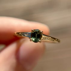 Fae Ring with an olive green Australian sapphire. Hand engraved details on each side. Fae Ring, Australian Sapphire, Emerald Rings, Montana Sapphire, Green Sapphire, Wedding Things, Emerald Ring, Hand Engraving