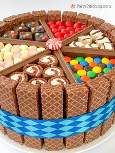 a chocolate cake with many different types of candies