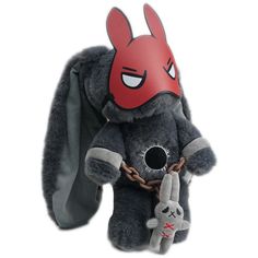 a stuffed animal with a red mask on it's face holding a toy rabbit