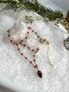 Buy individually or as a set & save! Choose from beautifully faceted Garnet rosary style chain, accented with lustrous Freshwater Pearls. Gorgeous classics with a bit of flair & color! Necklace: Rosary style faceted Garnets are accented with 6 X 10mm faceted barrel shaped Garnet pendant, which is hand wired to the center of the necklace. Length: 16" with 2" extender Bracelet: Faceted Garnets are wire wrapped in a rosary style chain and interspersed with 6 X 10mm faceted barrel shaped garnets thr Briolette Polished Beads Jewelry Gift, Garnet Jewelry With Faceted Round Beads, Red Faceted Spiritual Jewelry, Faceted Beads Rosary Bracelet For Gift, Dainty Faceted Bead Bracelet Jewelry, Dainty Bracelet With Faceted Beads, Dainty Faceted Bead Bracelet, Garnet Jewelry With Faceted Beads For Gift, Faceted Garnet Round Bead Jewelry