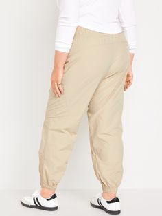 elastic-drawstring waist faux fly front pockets flap-cargo pockets at thigh side-zip hem elasticized cuffs sits at belly button loose hip and thigh tapered leg hits at ankle 29" regular inseam 27" petite inseam 32" tall inseam models are approx.  5'9" and wear sizes s (4), l (12), and xl (18)machine wash according to the care instruction label Stones Throw, Cargo Joggers, Jack Black, Petite Size, Tapered Legs, Drawstring Waist, Jogger Pants, Toddler Boys, Old Navy