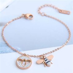 Honey Charm: Rose Gold Bee Pendant Bracelet-Fashion Bracelets & Bangles-StylinArts High Fashion Women, Bee Pendant, Gold Bee, Women Bracelet, Rhinestone Bracelet, Style And Grace, Pendant Bracelet, Playful Design, Delicate Bracelet