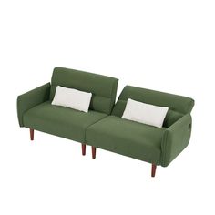 a green couch with two white pillows on it's arms and legs, against a white background