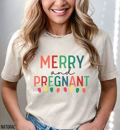 "This Christmas pregnancy shirt is a super cute and fun to way to announce your pregnant to family and friends this holiday season! This super soft and cozy baby reveal shirt will be your new favorite pregnant Christmas tee!  ♡STYLE Say hello to your new favorite t-shirt! All of our shirts are made with the highest quality materials and are super soft and cozy! Bella and Canvas Brand Shirts Solid Colors are 100% Cotton Heather Colors are 52% cotton, 48% polyester (Athletic Heather is 90% cotton, Pregnant Christmas Shirt, Pregnant Christmas, Disney Christmas Outfits, Christmas Maternity Shirt, Baby Reveal Shirt, Cute Pregnancy Announcement, Christmas Pregnancy Announcement, Christmas Pregnancy, Pregnancy Announcements