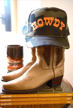 This Wild West Howdy Trucker Hat combines bold neon colors with a classic Western-style font, bringing a fun and vibrant twist to your everyday look. Featuring a breathable mesh back and a curved bill, it's the perfect blend of comfort and cowboy charm Brown Trucker Hat For Western-themed Events, Western Themed Snapback Trucker Hat, Brown Western Trucker Hat, One Size Trucker Hat For Western-themed Events, Adjustable Snapback Trucker Hat For Western-themed Events, Car Fragrance, Perfect White Tee, Arctic Fox, Vintage Patches