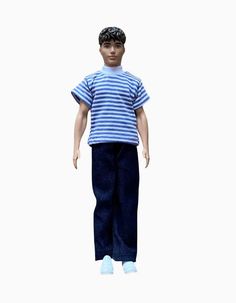 a doll is wearing a blue and white striped shirt with black hair, jeans and sneakers