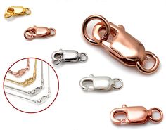 several different types of metal clasps on white background