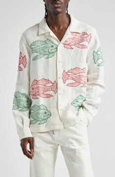 Embroidered fish appliqués bring artisanal richness to your ensemble as they swim across the fresh linen backdrop of this long-sleeved camp shirt. 27" length; 45" chest (size Large) Front button closure Convertible collar Long sleeves with button cuffs 100% linen Dry clean Imported Designer Clothing Santorini Men Outfit, Embroidered Linen Long Sleeve Shirt, White Fish Print Shirt For Summer, Linen Backdrop, Embroidered Fish, Masculine Clothing, White Linen Trousers, Beach Blouse, Convertible Collar