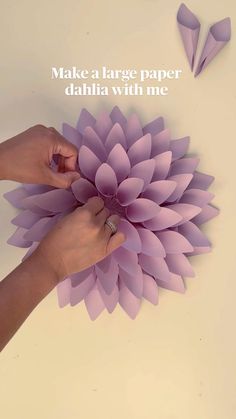 someone is making a paper dahlia with me