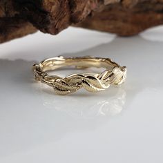 Beautiful, highly detailed Leaf, Twig & Vine Eternity Ring, hand sculpted by me...Dawn Vertrees. I hand sculpted a twig band using the lost wax method and then added my hand sculpted leaves each having my signature texture and then added a stem to each leaf. The vine wraps around the twig giving the ring additional depth. This band has 360 design and is made in your size. On the inside of the ring has a polished finish for comfort Materials: 14k White Gold 14k Yellow Gold 14k Rose Gold 18k G Nature-inspired Hallmarked Jewelry For Anniversary, 14k Gold Wedding Jewelry Hand Cast, Hand Cast 14k Gold Wedding Jewelry, Hand Cast Yellow Gold Wedding Jewelry, Carved Fine Jewelry For Wedding, Fine Carved Jewelry For Weddings, Carved Fine Jewelry For Weddings, Hand Cast Jewelry For Anniversary, Hand Cast Yellow Gold Jewelry For Wedding