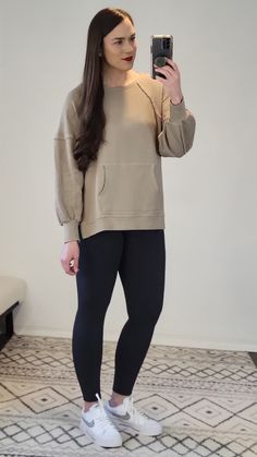 Details: Like a hoodie, but without the hood! The perfect pullover neutral sweatshirt with a kangaroo pocket is finally here! Looks cute with leggings or jeans! Relaxed Fit. Materials: 100% Cotton Made In: China Sizing Tip: Order TTS. Size down if inbetween. I am about 5’7 165 pounds and a 34B, and I am generally a Size S/M top and I am wearing the Small. Katie is a true size L and is wearing the L. Everyday Cozy Hoodie With Kangaroo Pocket, Comfy Sweatshirt With Kangaroo Pocket For Everyday, Cozy Hoodie With Kangaroo Pocket For Everyday, Comfy Hoodie With Kangaroo Pocket For Everyday, Stretch Athleisure Hoodie For Everyday, Comfy Hoodie With Kangaroo Pocket For Fall, Comfy Fall Hoodie With Kangaroo Pocket, Comfortable Stretch Hoodie For Fall, Comfy Stretch Sweatshirt For Everyday