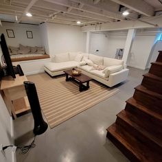 the living room is clean and ready for guests to use it as an entertainment area