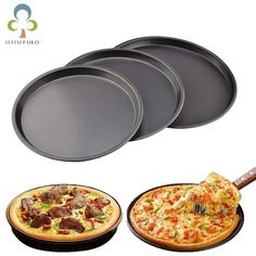 four pizza pans with different toppings on them and one being used as a spatula