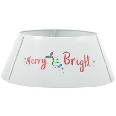 a white lamp shade with merry and bright written on it